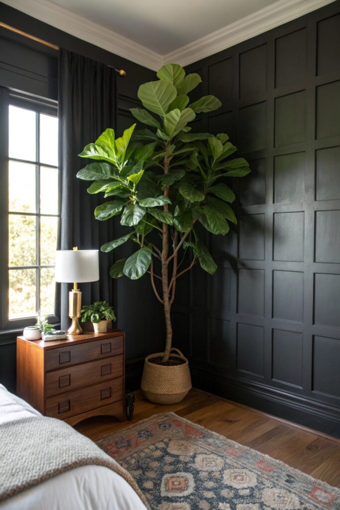 12 Black Themed Bedroom Ideas That Feel Bold, Modern, and Cozy black backdrop greenery bedroom plants